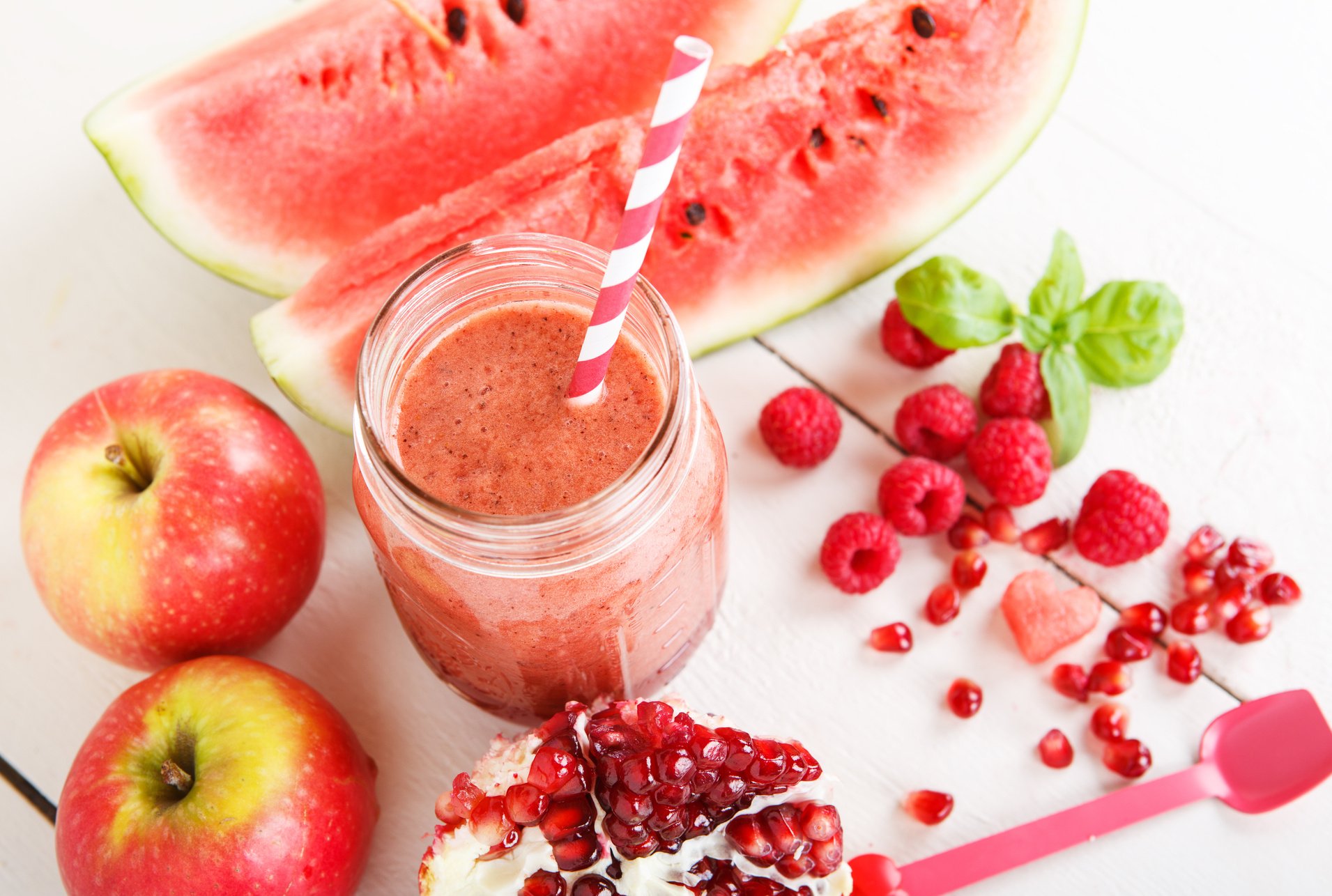 Fresh organic red smoothie with apple, watermelon, pomegranate,